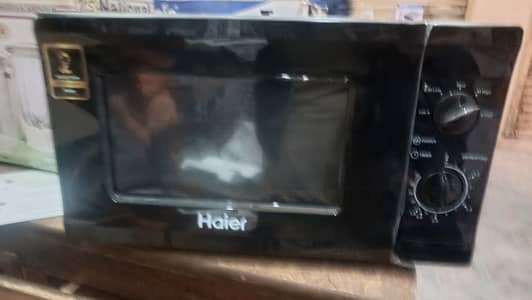 Haier 20L solo microwave oven with stylish black design