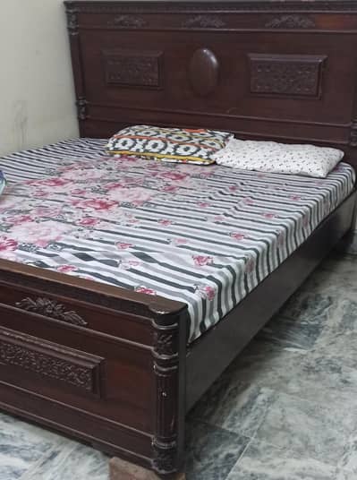 king size heavy wooden bed  10/10 condition if u want images msg me