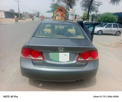 Honda reborn 2009 model automatic with sunroof is available for sale