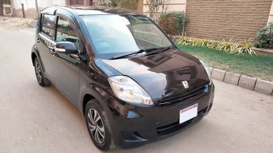 TOYOTA PASSO Automatic Model 2007 Registered 2012 Pearl Black color.
