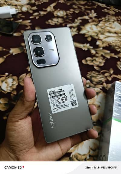 infinix note 50 complete box with wriless charger 10 by 10