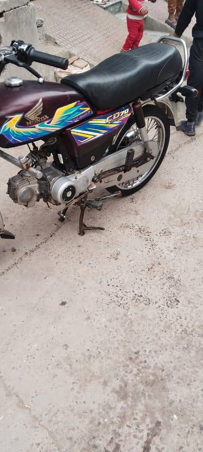Honda 70 2021 model  number lga hai doucmnt clear hai bio moqy py