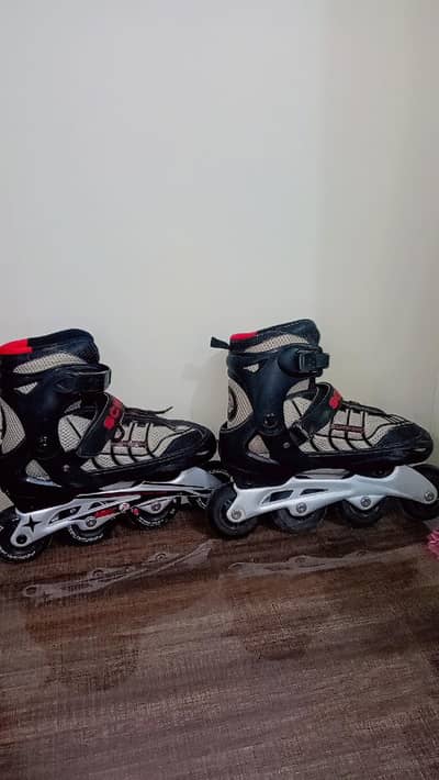 skates only two month use, black and red