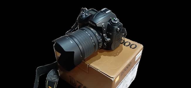 Original Nikon d7000 with 18-105 mm, box and accessories