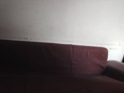 A sofa bed with storage underneath