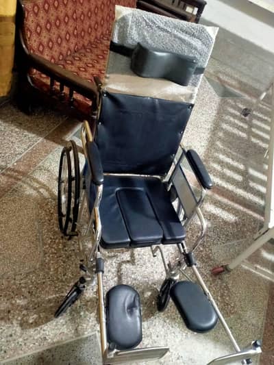 wheel chair with toilet accessibility