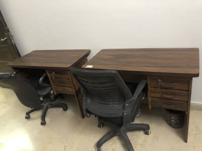 Set of 2 tables and chairs available for sale.