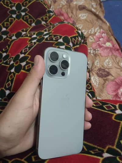 iphone 15 pro max jv  ( with original charger)