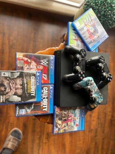 ps4 slim - 3 controllers + 5 games - excellent condition