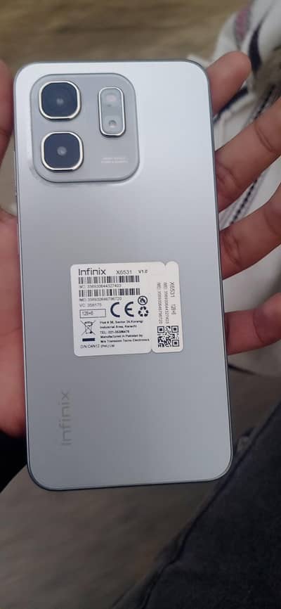 infinix hot 50i with box and charger 6gb ram 128gb memory