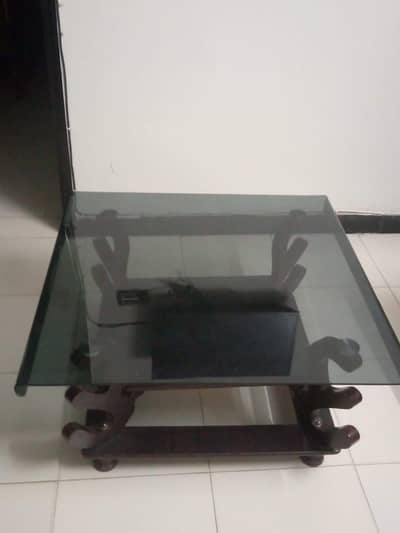 Black top glass center table
