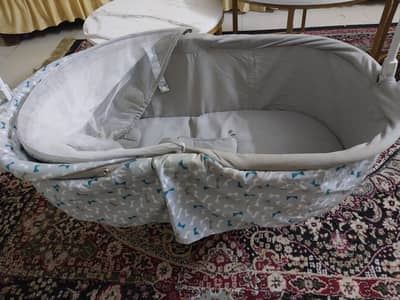 Branded electric baby swing and cot for sale.