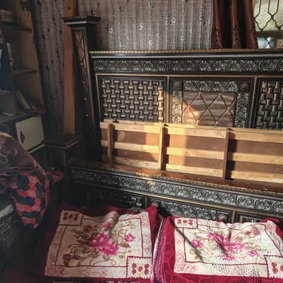 bed with side tables and dressing