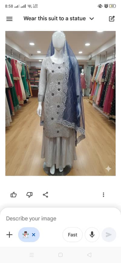 Stunning Silver Embroidered Party Wear Suit with Navy Blue Net Dupatta