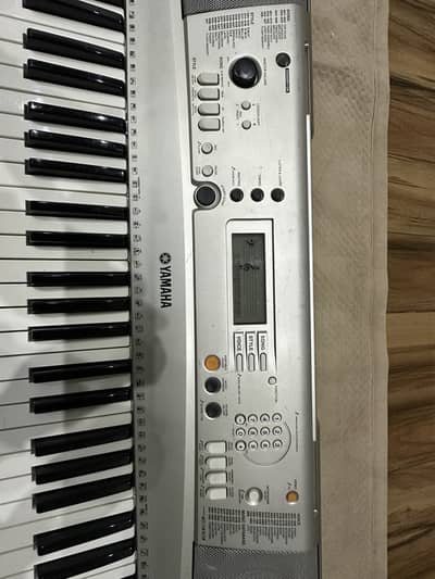 Yamaha psr e313 keyboard piano 61 keys touch response
