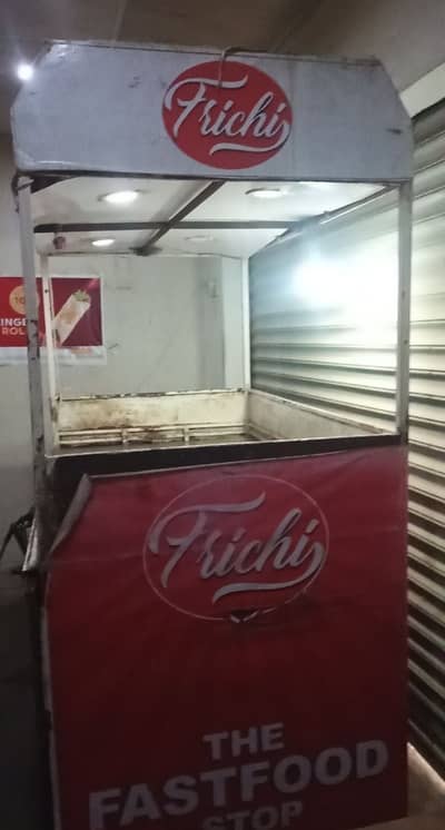 Large fries and fastfood counter with 2 fryers