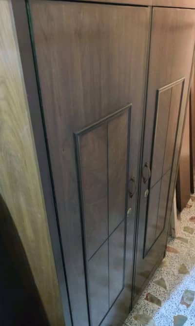 Bed, cupboard and dressing