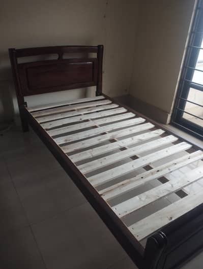 2x Single Wooden Bed.
