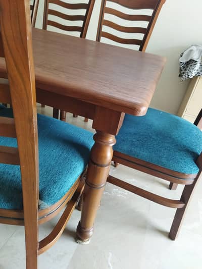 Dining table with 8 wooden chairs