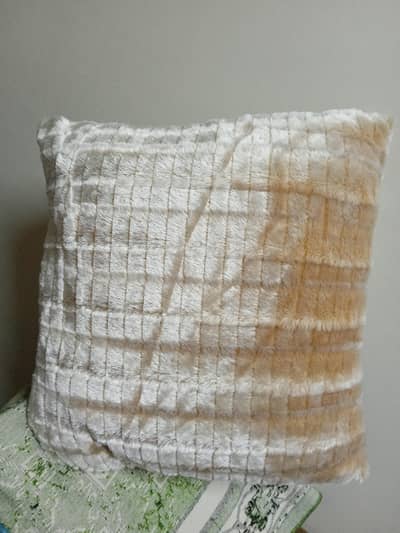 four pieces velvet covered cushion
