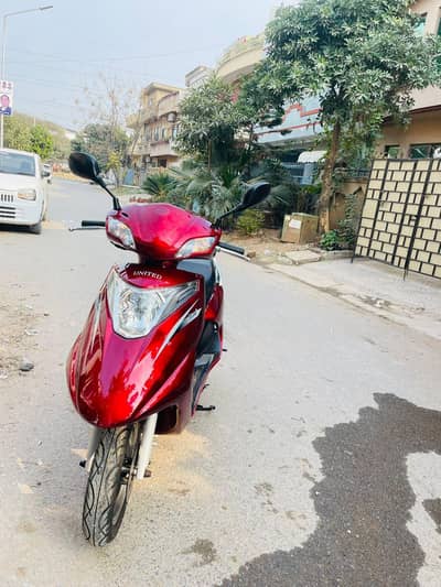 United 100cc Scooty – Red Color – Excellent Condition – Low Mileage