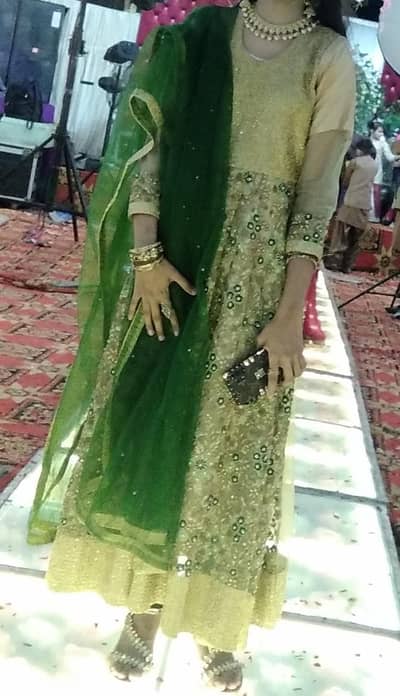 Golden Embroidered Suit with Green Net Dupatta – Wedding Wear