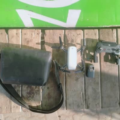 DJI spark dron good condition bas bettery thori weakness hay