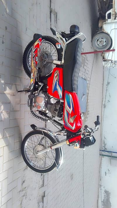 Honda 125 red colour 10/9 condition