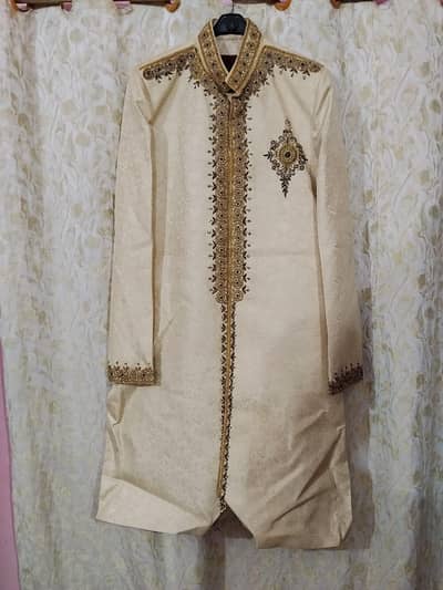 Grooms sherwani, khusa, and kula for sale.