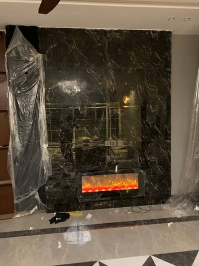 Fireplace - Electric fireplace - Marble wall with fireplace work