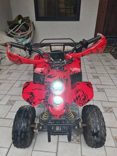 Good condition , very less used quad bike 70cc