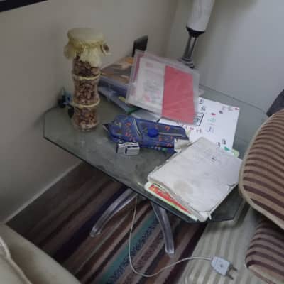 three tables of glass