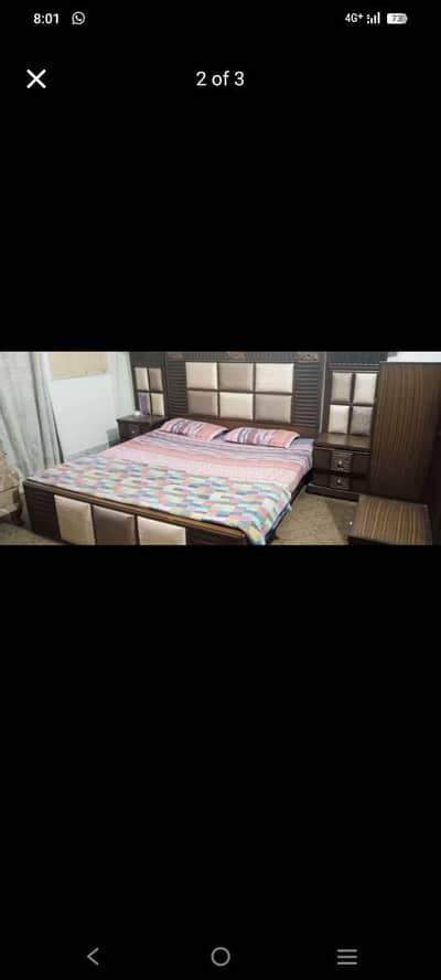 dubble bed with 2 site table and 1 dressing table