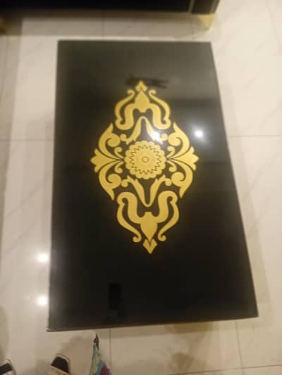 Black and golden brand new table  03044453724