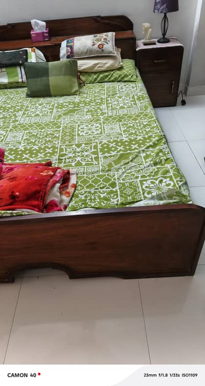 double bed set with two side tables and ortho meters