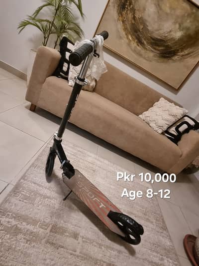 Kids scooter , adjustable handle, brakes , age 8-12