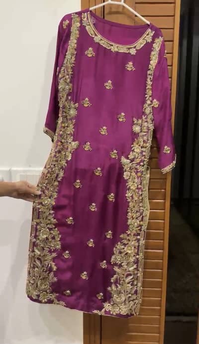 Self stitched embroidered dress