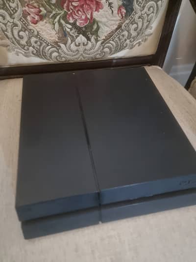 PS4 with Box[Latest 2015 Model] (9 Games Installed with 5 DVD's]