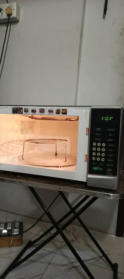 Haier 2 in 1 microwave grill oven with grill stand koi fault nh