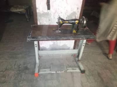 Slai Mashine ka table our stand