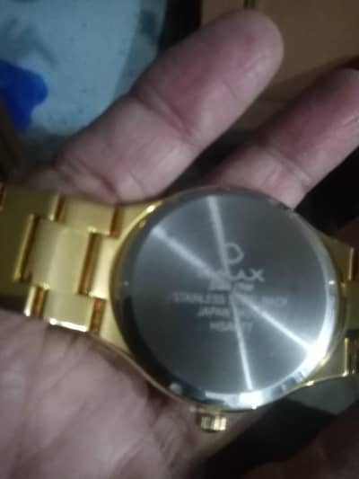 Golden stainless steel men's wrist watch,
