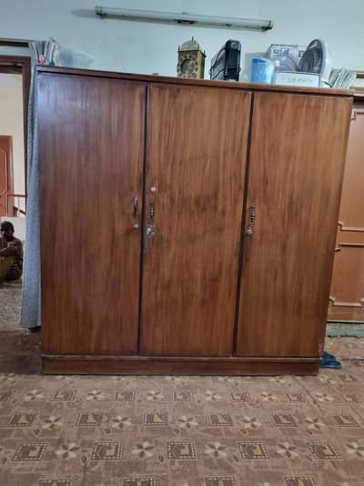 Three door wooden cupboard