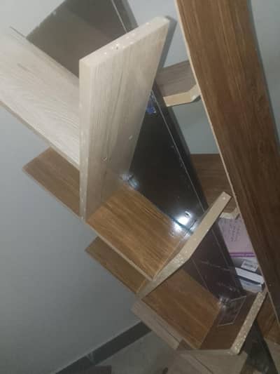 two study chairs one book shelf one table mirror top