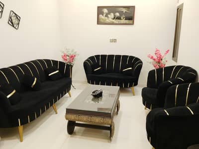 Black colour Crown shape 7 seater sofa with table