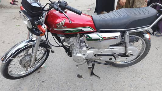 Honda 125 self start silver edition