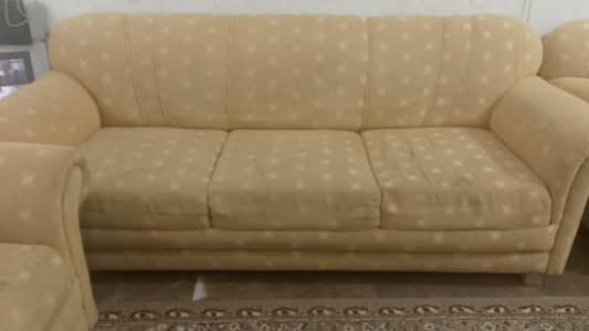 Good condition not new but looking new sofa set