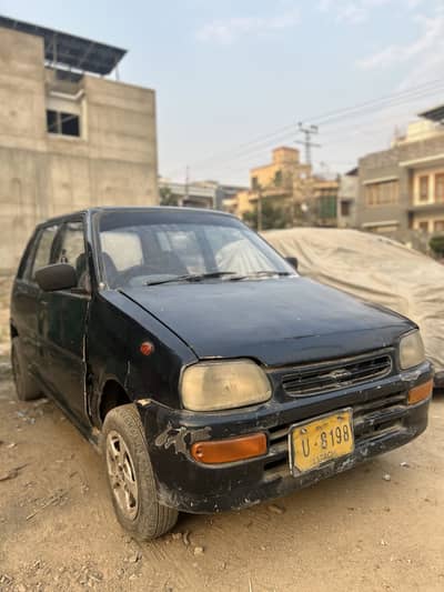 Daihatsu Cuore { Imported }