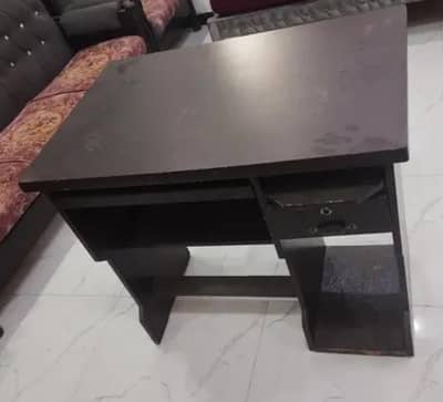 Computer table up for sale in a very good condition