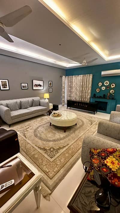 One Kanal Slightly Used Ultra Modern Designer Owner Build Fully Furnished Bungalow 15KV Solar Attached For Sale At Prime Location Of DHA Lahore Near To Park Masjid & Commercial Market.