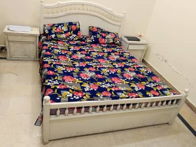 Bed with side tables